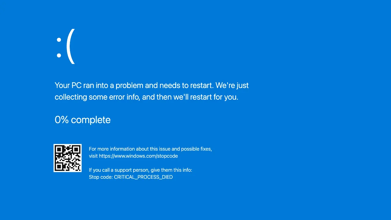 Blue screen of death Windows 11 palsu dengan wajah sedih, penghitung persentase, dan kode QR